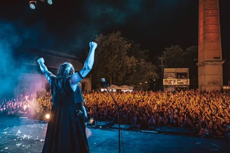 Arms Raised to Technopolis Crowd